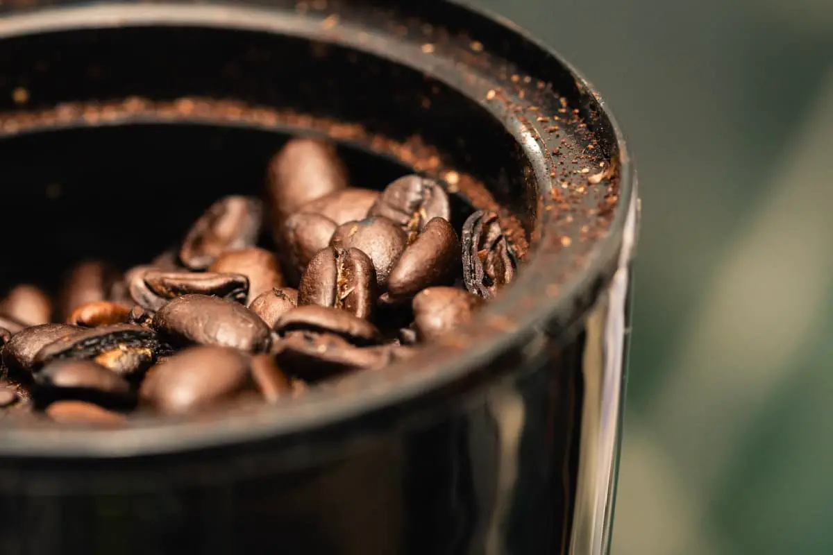 in the process of grinding coffee beans