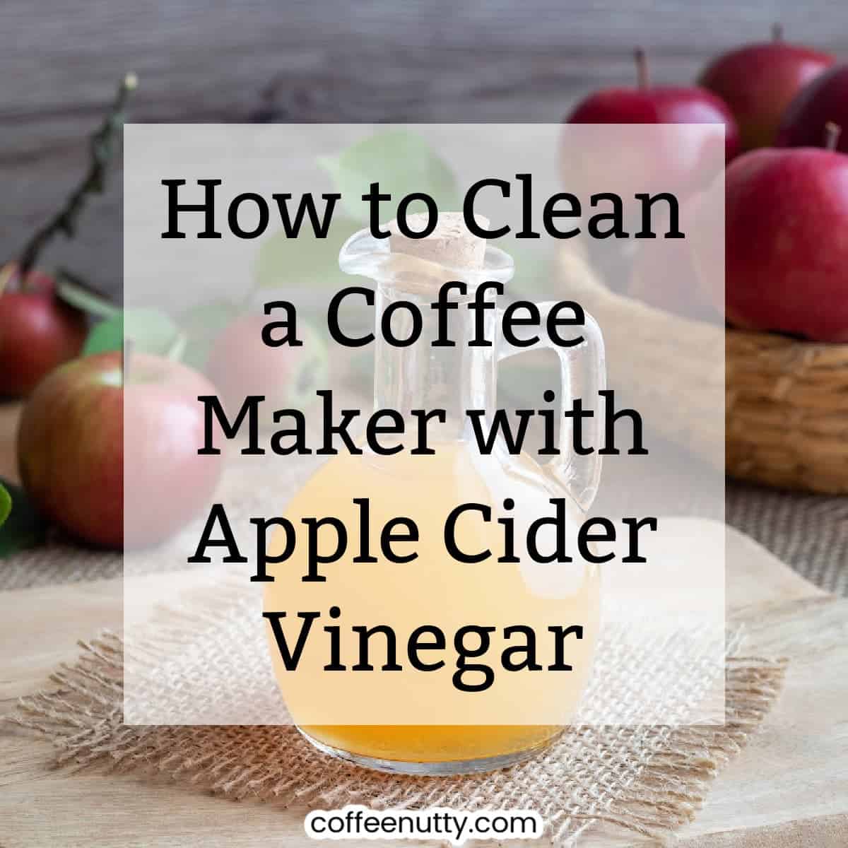 Apple cider vinegar on wood table with text overlay reading "how to clean a coffee maker with apple cider vinegar".