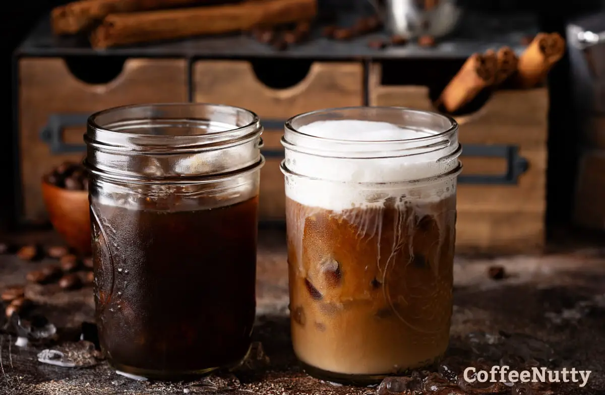 Coffee in clear mugs with one topped with cold foam.