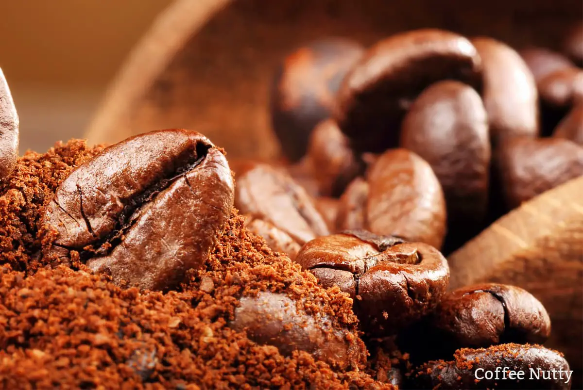 Coffee beans mixed with coffee grounds-half caff coffee.