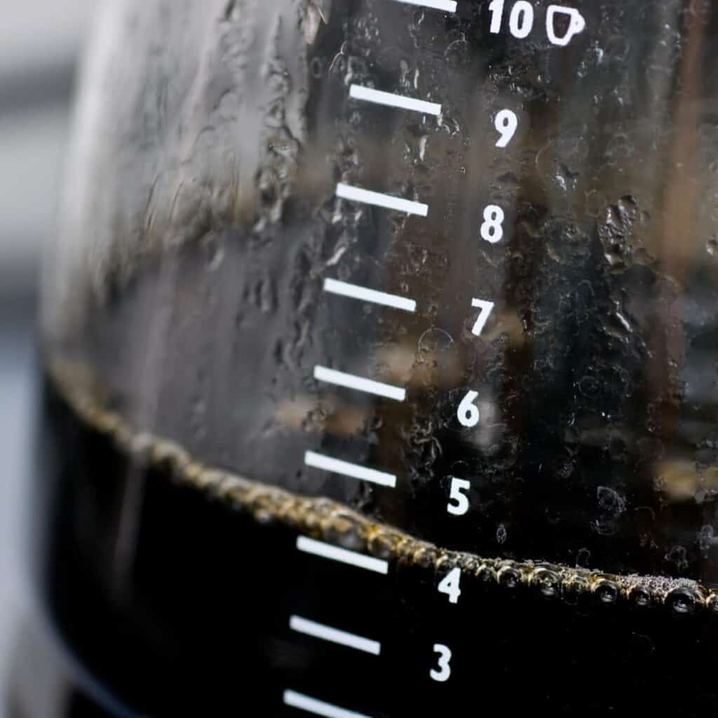 A few cups of coffee remaining in coffee pot.