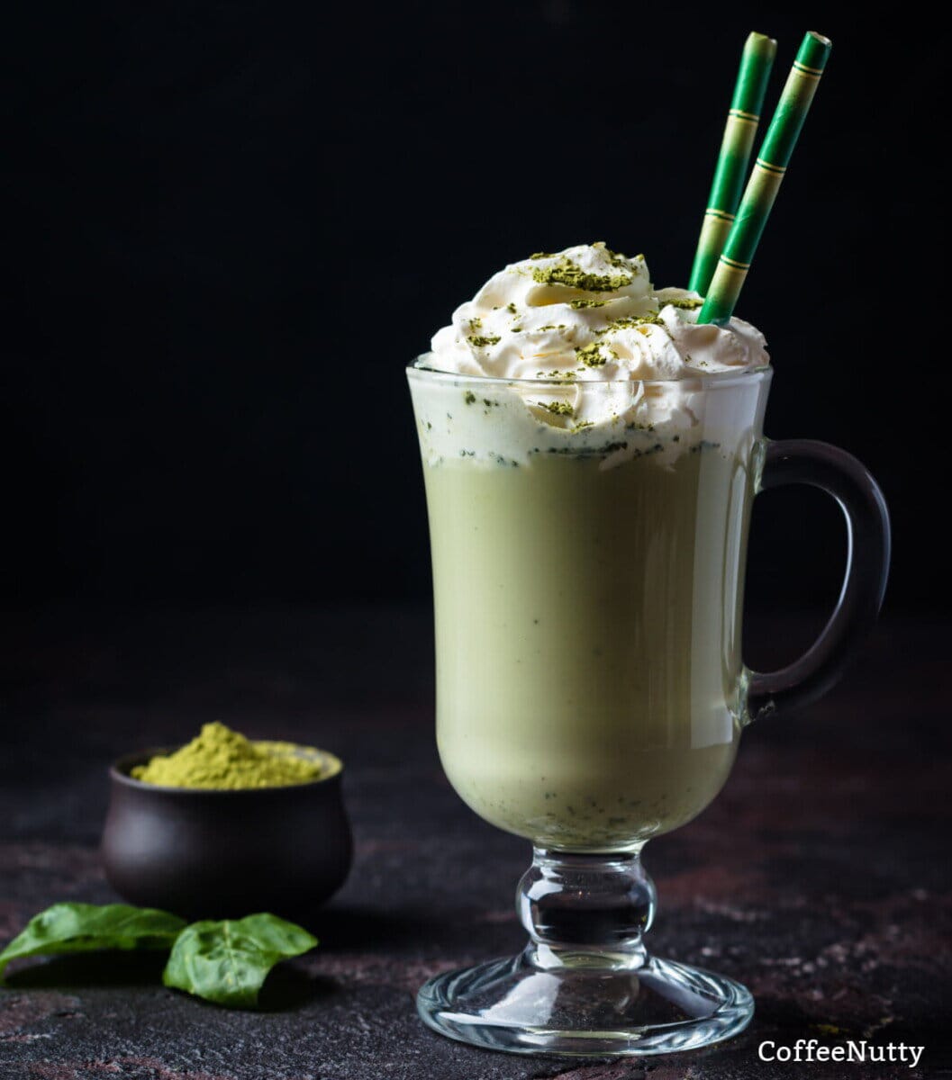 Green, matcha latte with frothed milk.