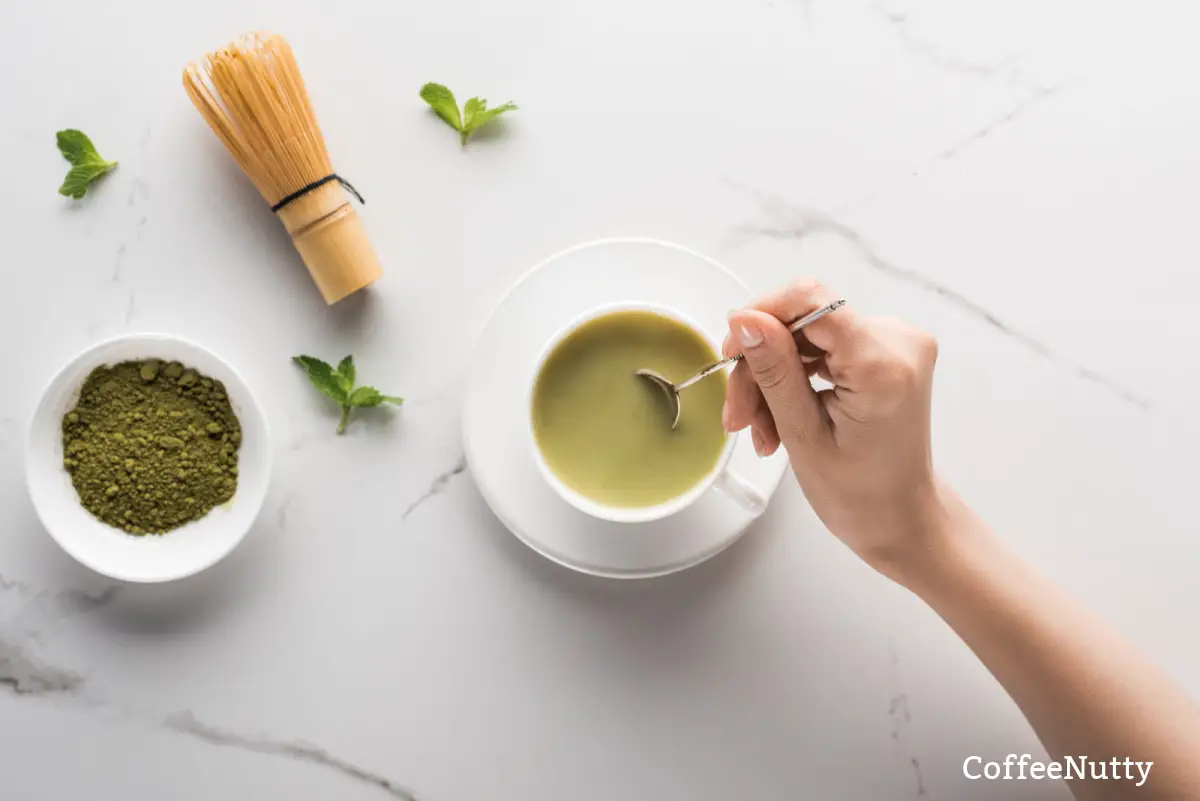 Woman stirring matcha tea -replace morning coffee hero image.